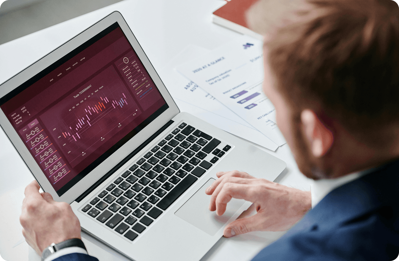 Consultant reviewing a dashboard on a laptop
